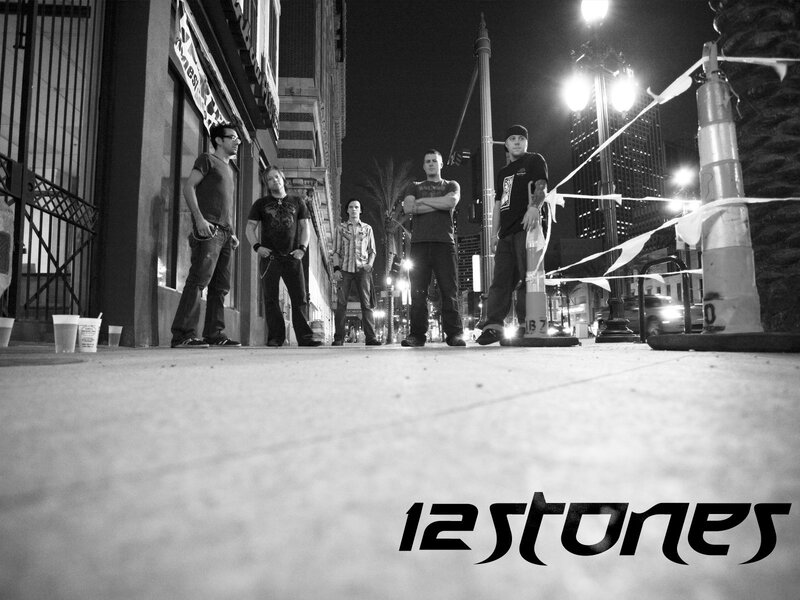 band on city street at night