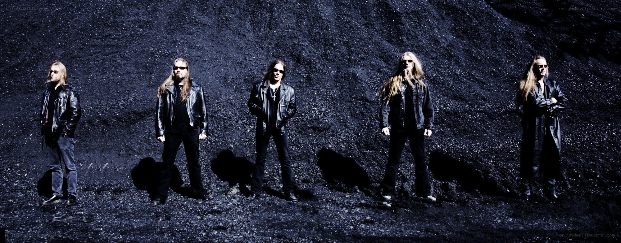 band on dark hillside