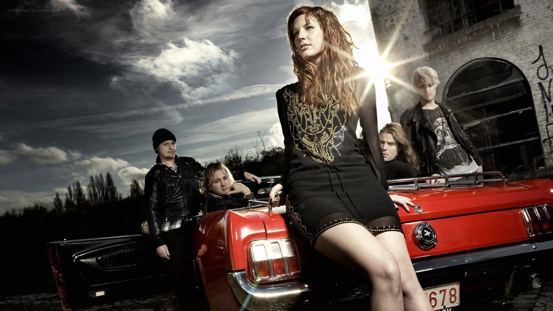 band on red car