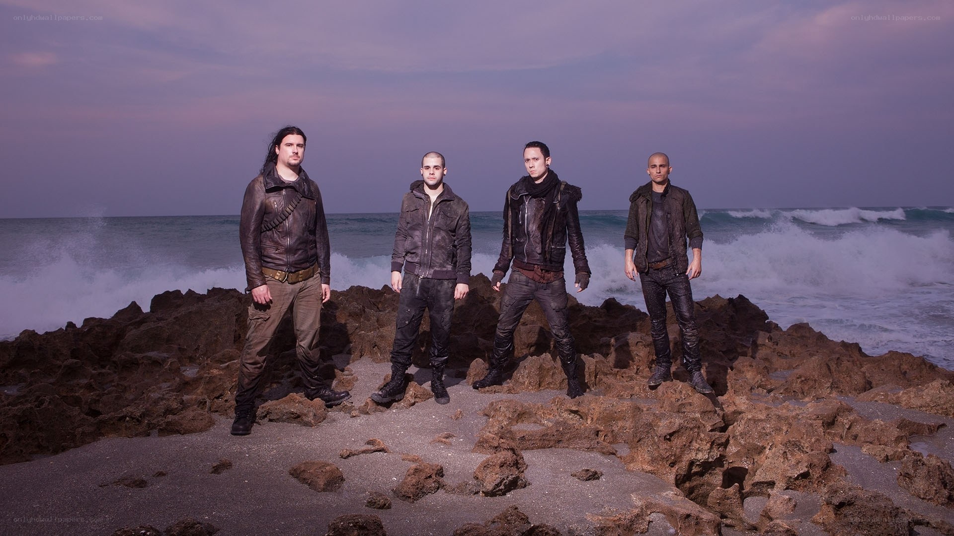 band on rocky beach