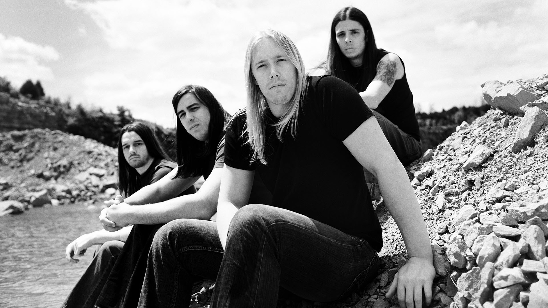 band on rocky shore