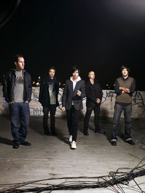 band on rooftop at night