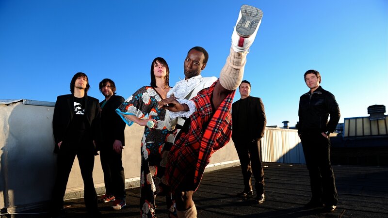 band on rooftop with dancer