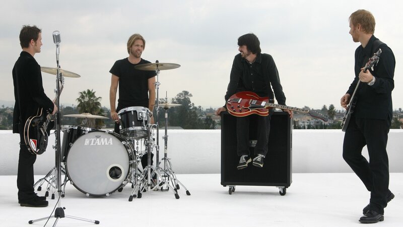 band on rooftop with instruments
