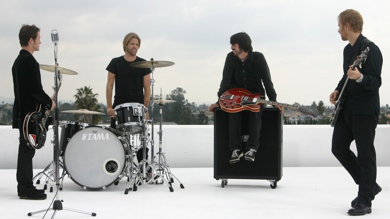 band on rooftop with instruments