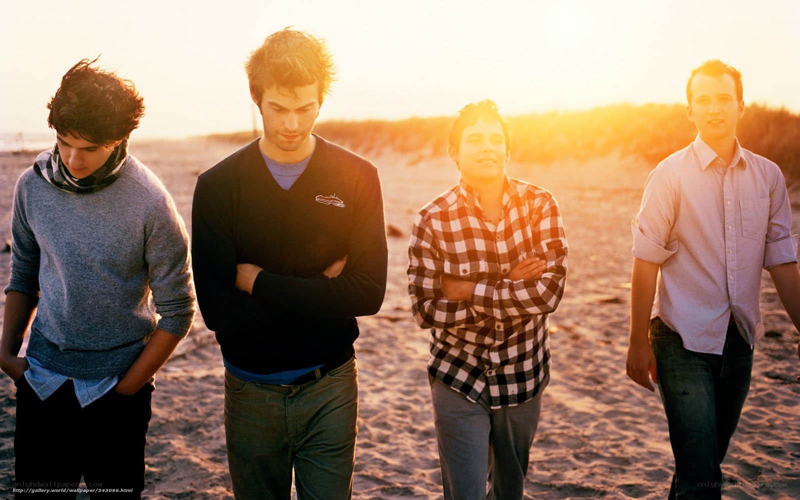 band on the beach at sunset