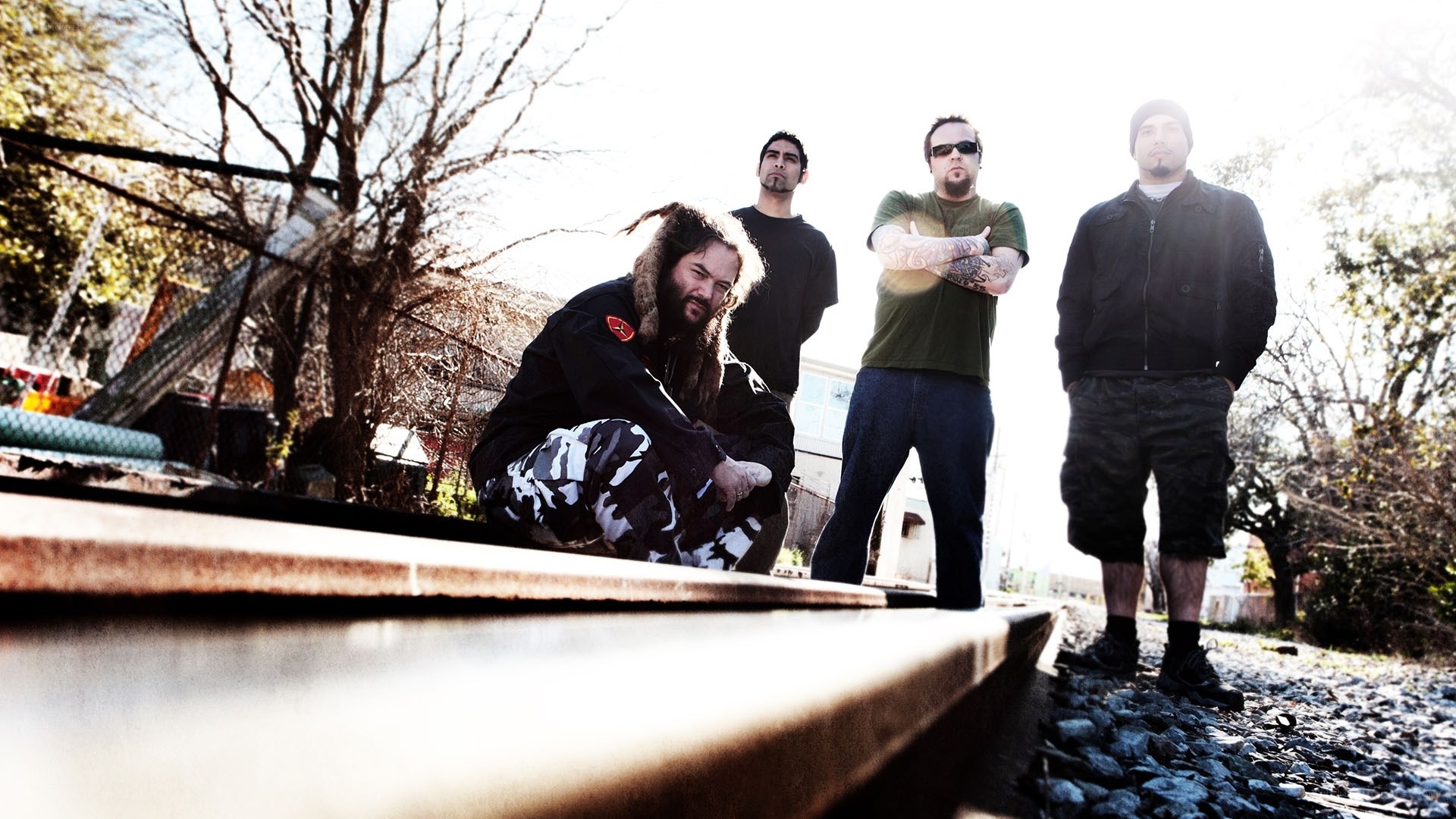 band on train tracks
