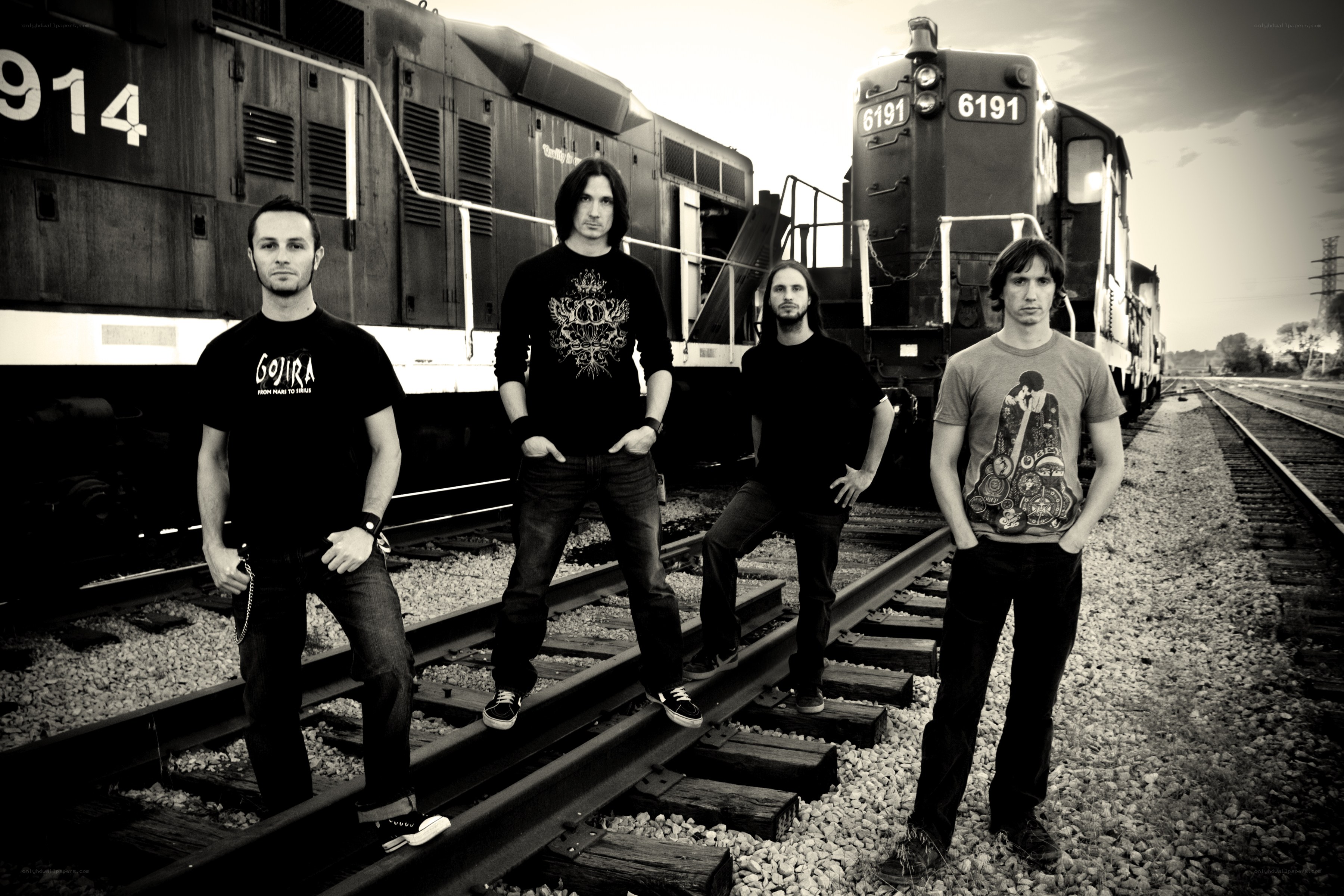 band on train tracks