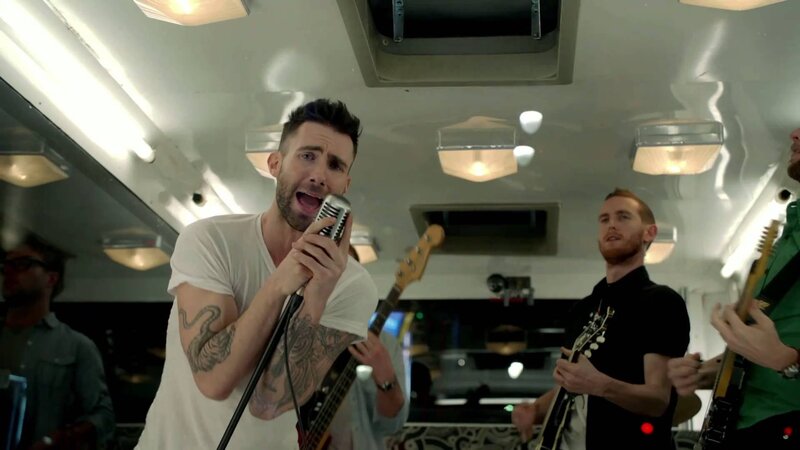 band performing in a bus