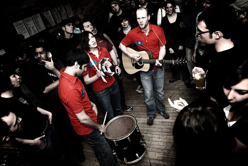 Band performing in a crowded venue