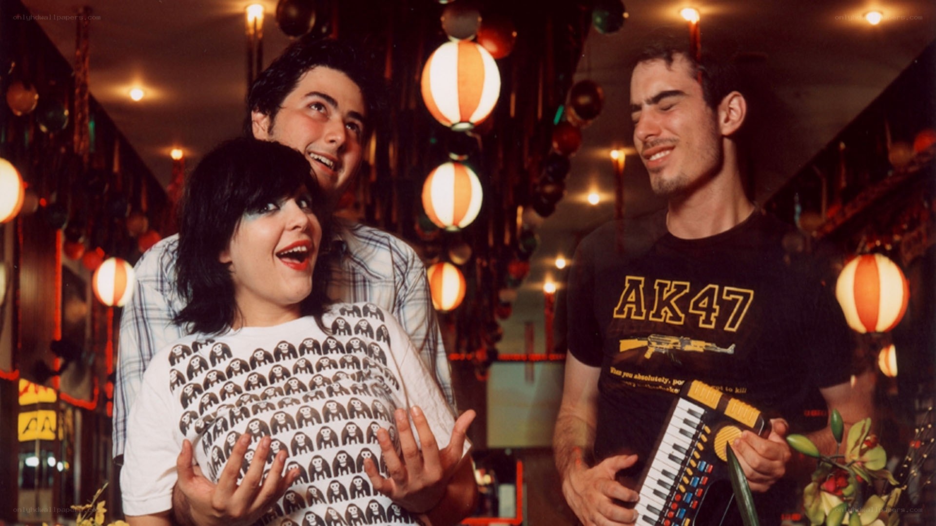 band performing in a decorated room