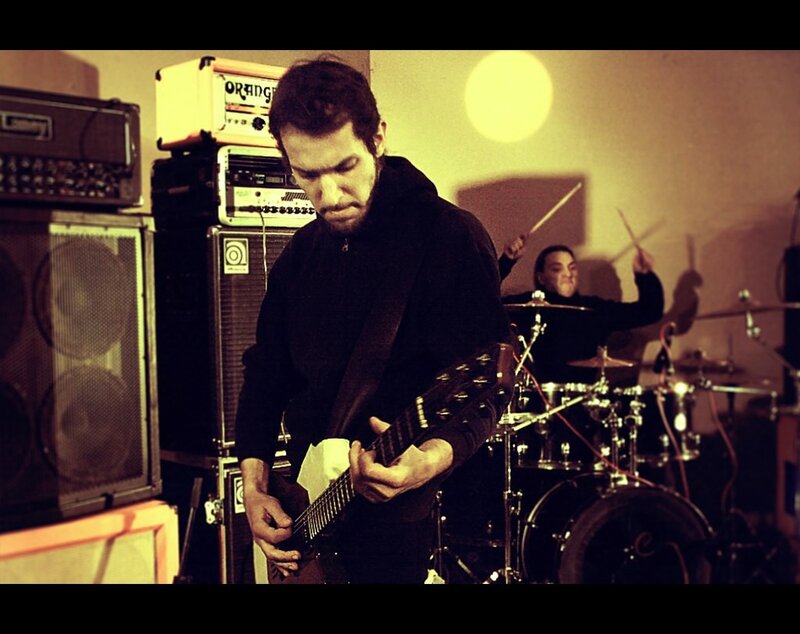 band performing in a practice space