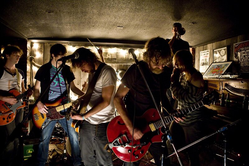band performing in a small venue
