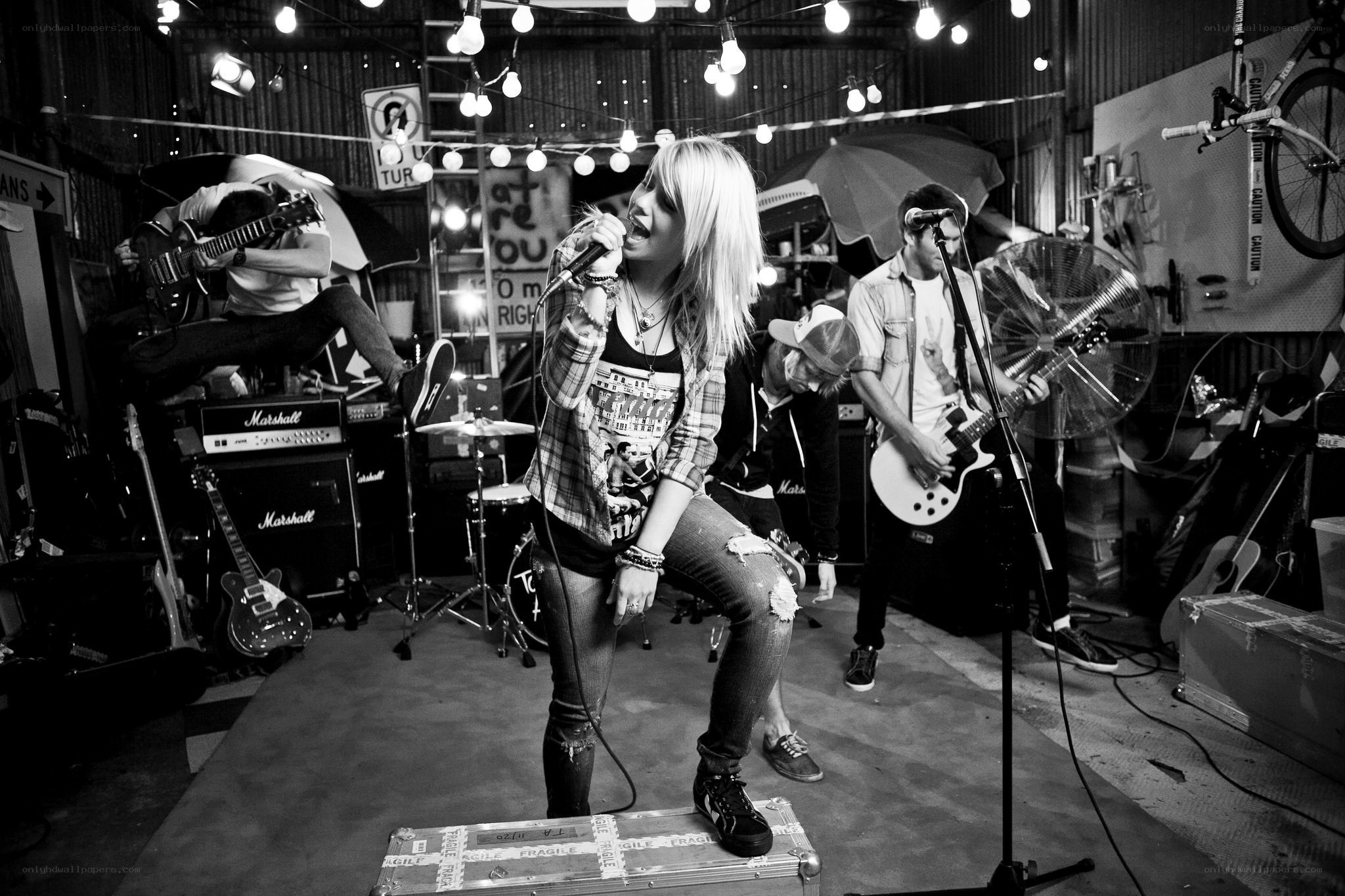 band performing in garage