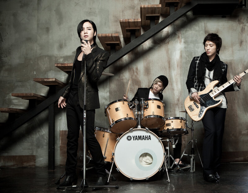 band performing in industrial setting