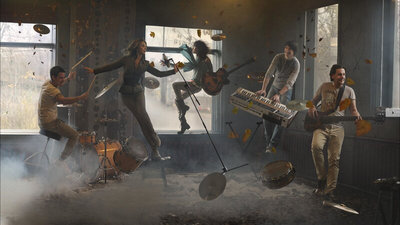Band Performing in Room — Brown