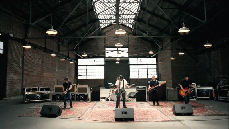 band performing in warehouse