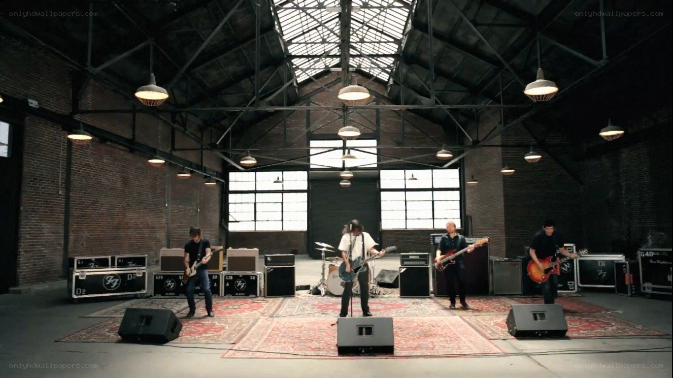 band performing in warehouse