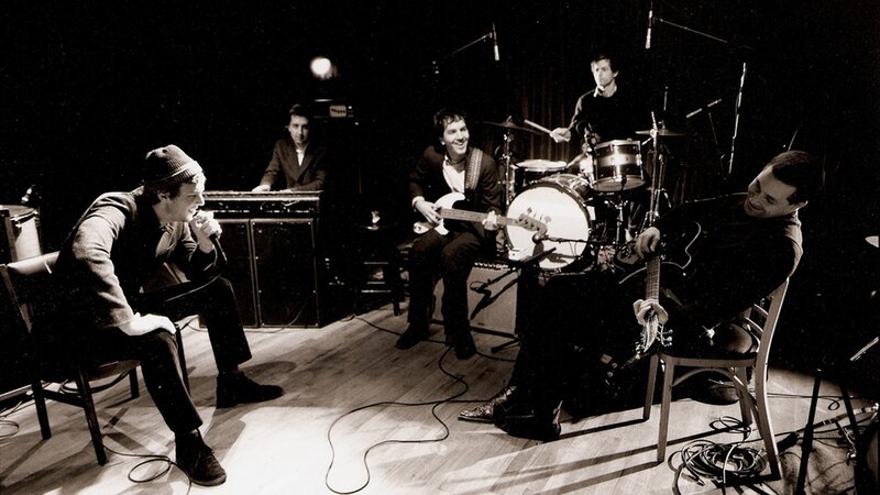 Band performing live on stage