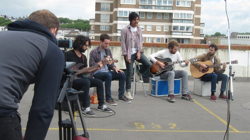band performing on rooftop