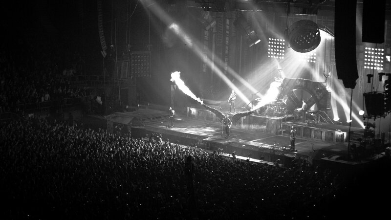 Band Performing on Stage — Black, Dramatic, Night, Photograph, Crowd, Fire, Lights