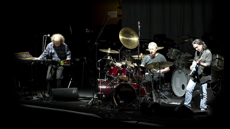 Band Performing on Stage — Black, Dramatic, Night, Photograph, Drums, Keyboard