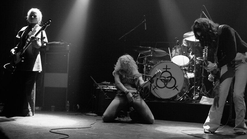 Band Performing on Stage — Black, Dramatic, Night, Photograph, Guitarist, Drummer, Singer