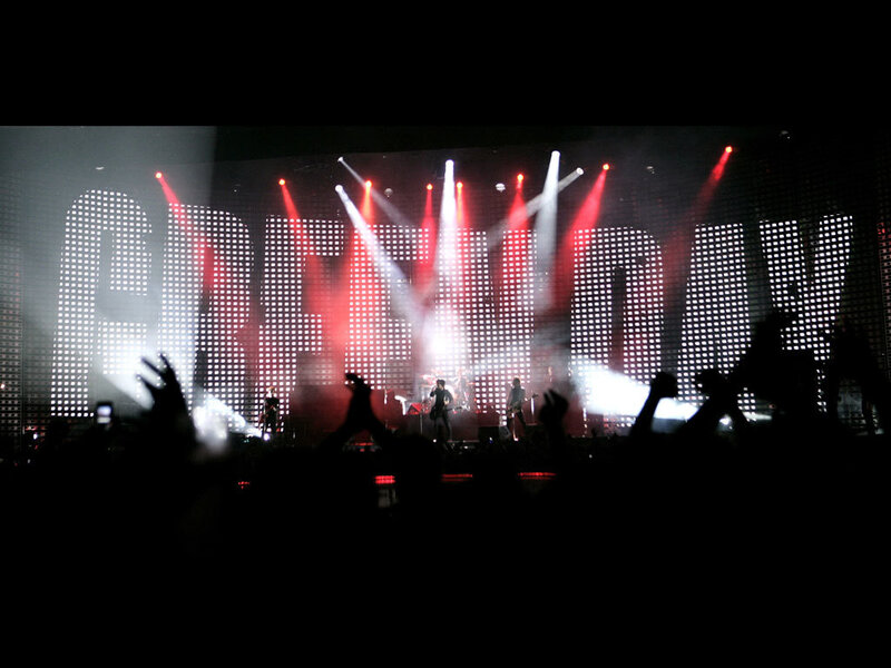 Band Performing on Stage — Black, Energetic, Night, Photograph, Concert, Crowd