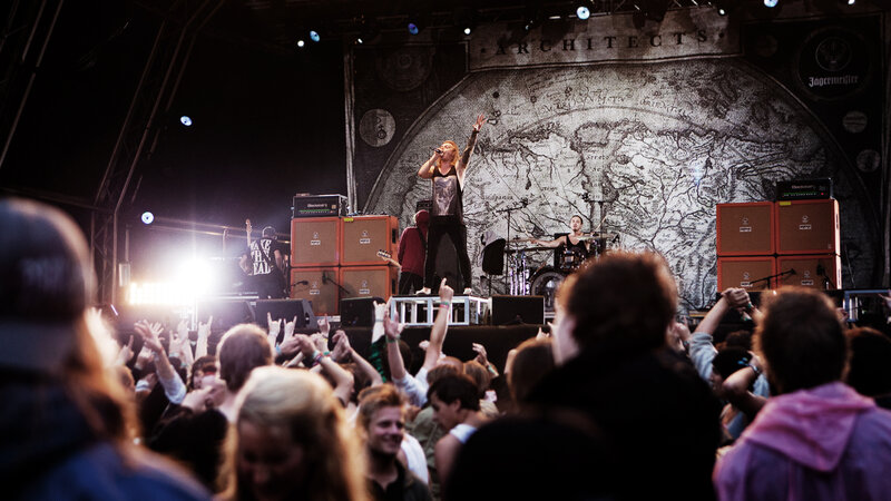 Band Performing on Stage — Black, Energetic, Night, Photograph, Crowd, Musicians