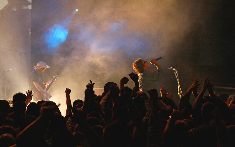Band Performing on Stage — Black, Energetic, Night, Photograph, Crowd