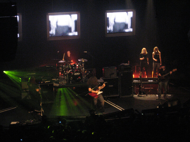 Band Performing on Stage — Black, Energetic, Night, Photograph, Drummer, Guitarist