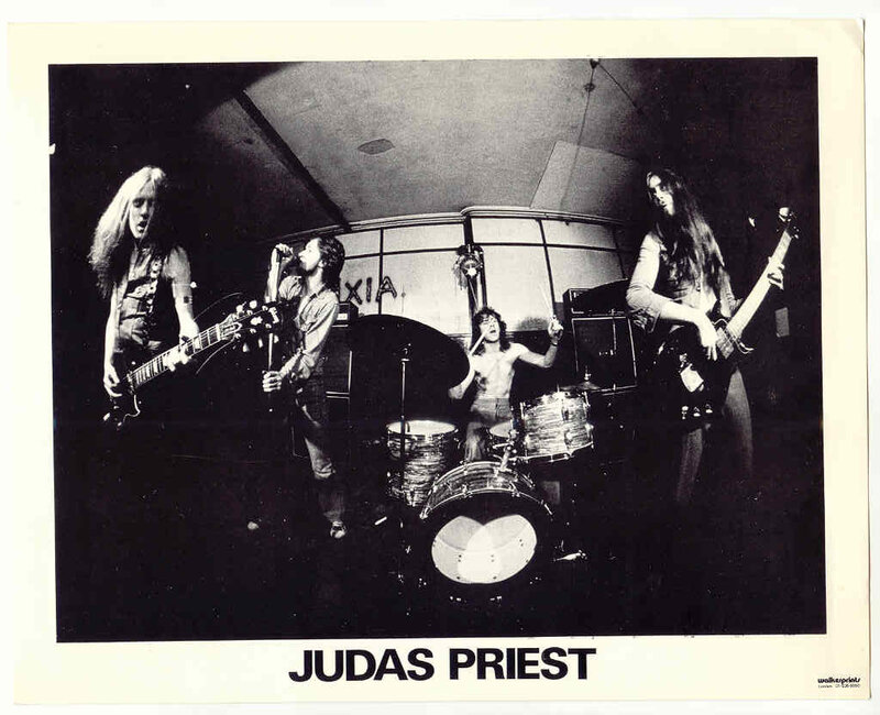 Band Performing on Stage — Black, Energetic, Night, Photograph, Guitarist