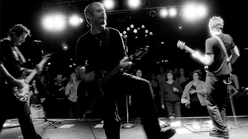 Band Performing on Stage — Black, Energetic, Night, Photograph, Guitarists, Audience