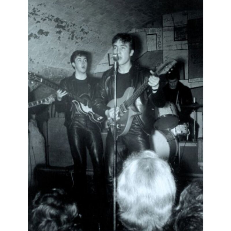 Band Performing on Stage — Black, Energetic, Photograph, Guitar, Microphone, Drums, Audience