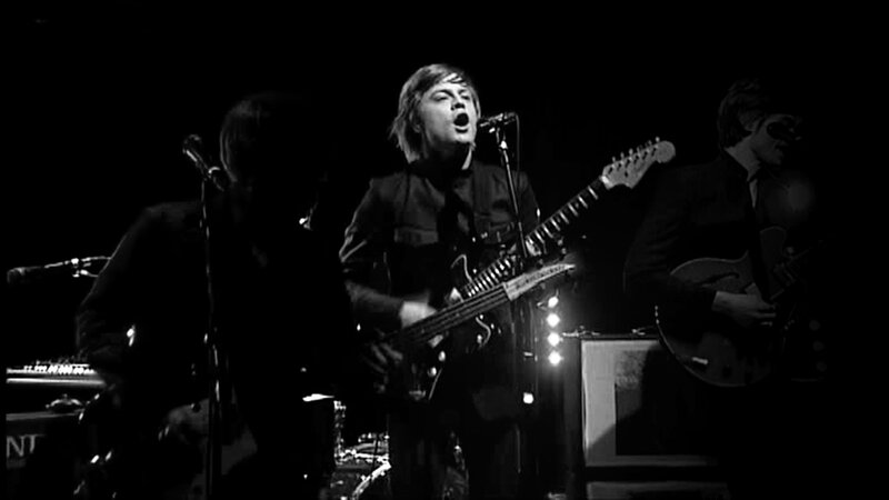 Band Performing on Stage — Black
