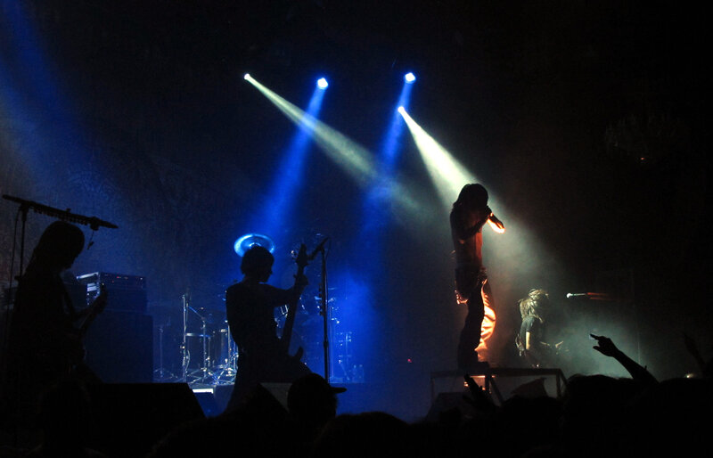 Band Performing on Stage — Blue, Dramatic, Night, Photograph