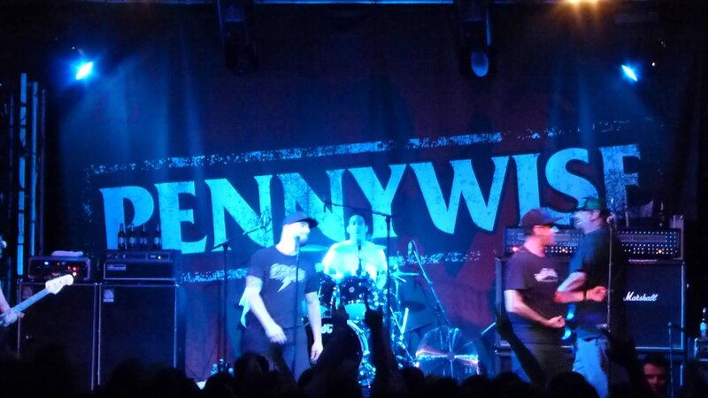Band Performing on Stage — Blue, Energetic, Night, Photograph, Drums, Guitar