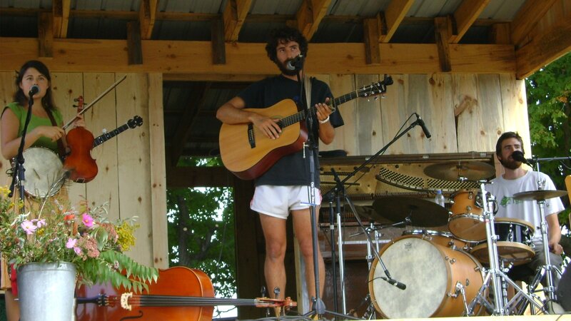 Band Performing on Stage — Brown, Outdoor
