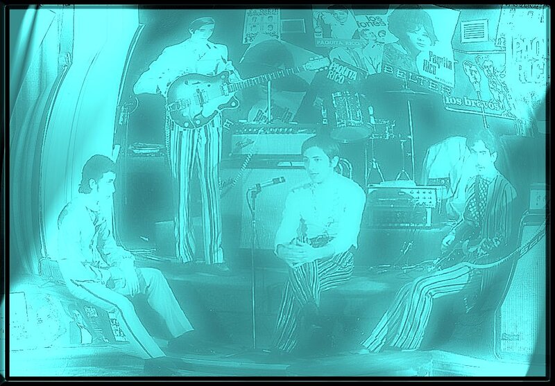 Band Performing on Stage — Cyan