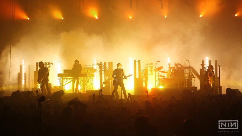 Band Performing on Stage — Orange, Dramatic, Night, Photograph