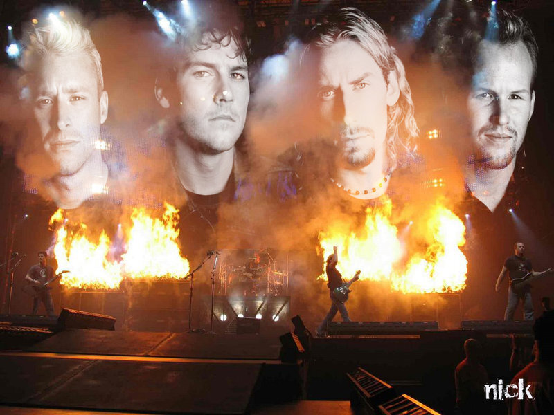 Band Performing on Stage — Orange, Dramatic