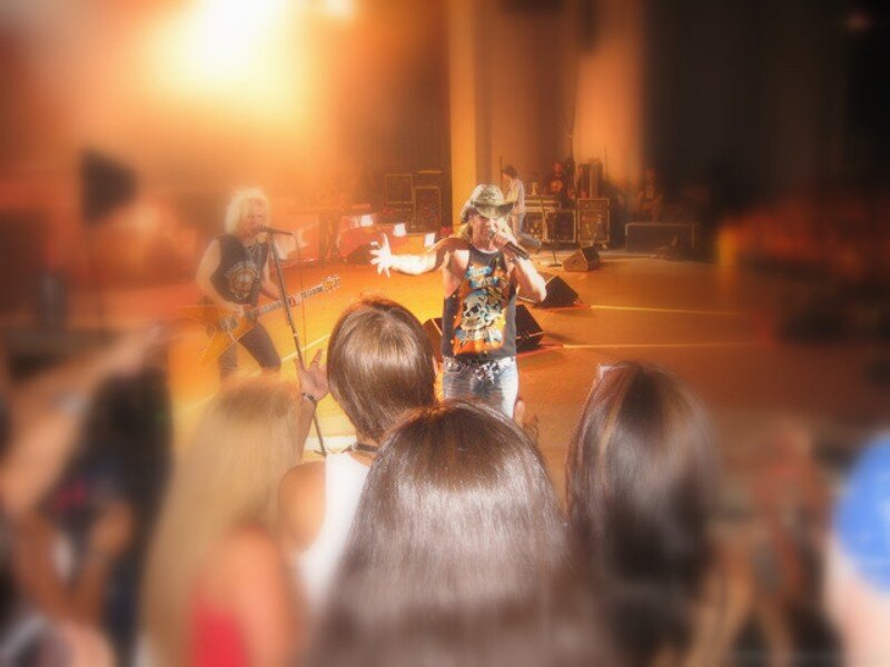 Band Performing on Stage — Orange, Energetic, Night