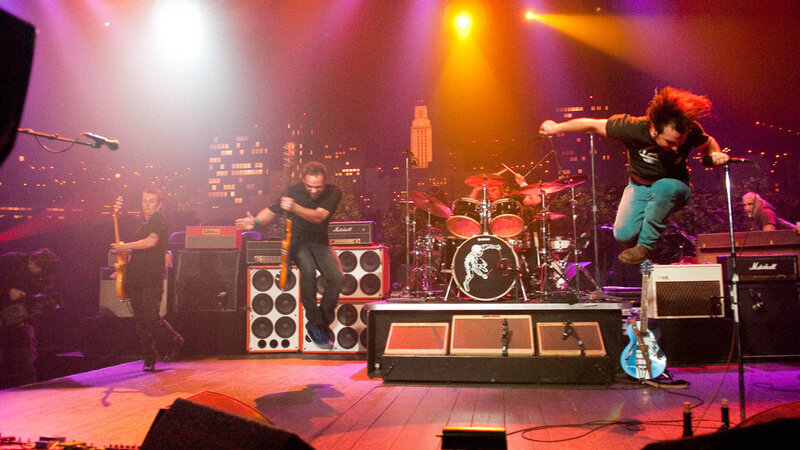 Band Performing on Stage — Purple, Energetic, Night