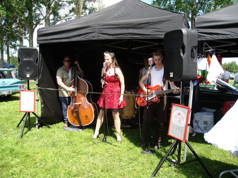 Band Performing Outdoors — Green