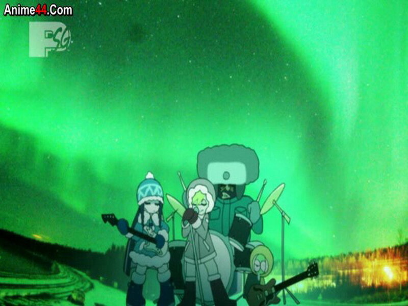 Band Performing under Aurora