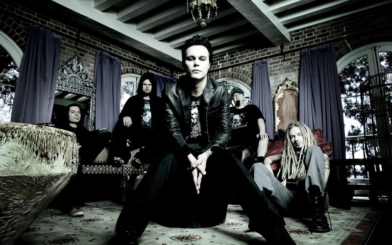 band photo in ornate room
