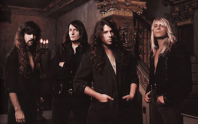 band photo in ornate room