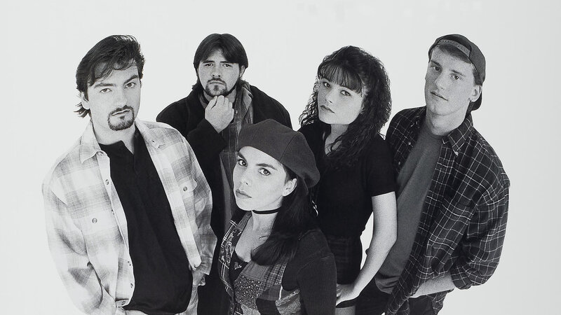 band photo of five members