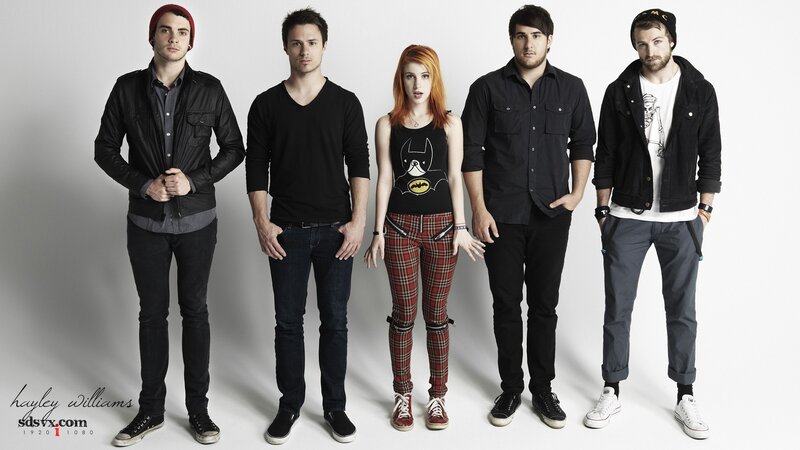 band photo of five members