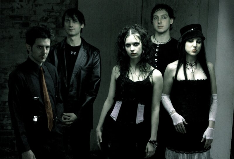 band photo of five members